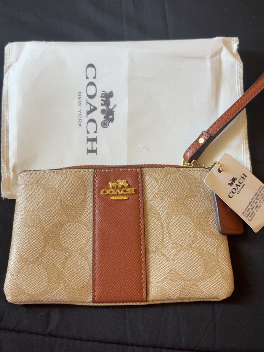 COACH Signature Canvas Wristlet in Tan and Brown
